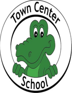 Town Center School logo featuring a friendly green cartoon alligator peeking over the bottom. TITLE